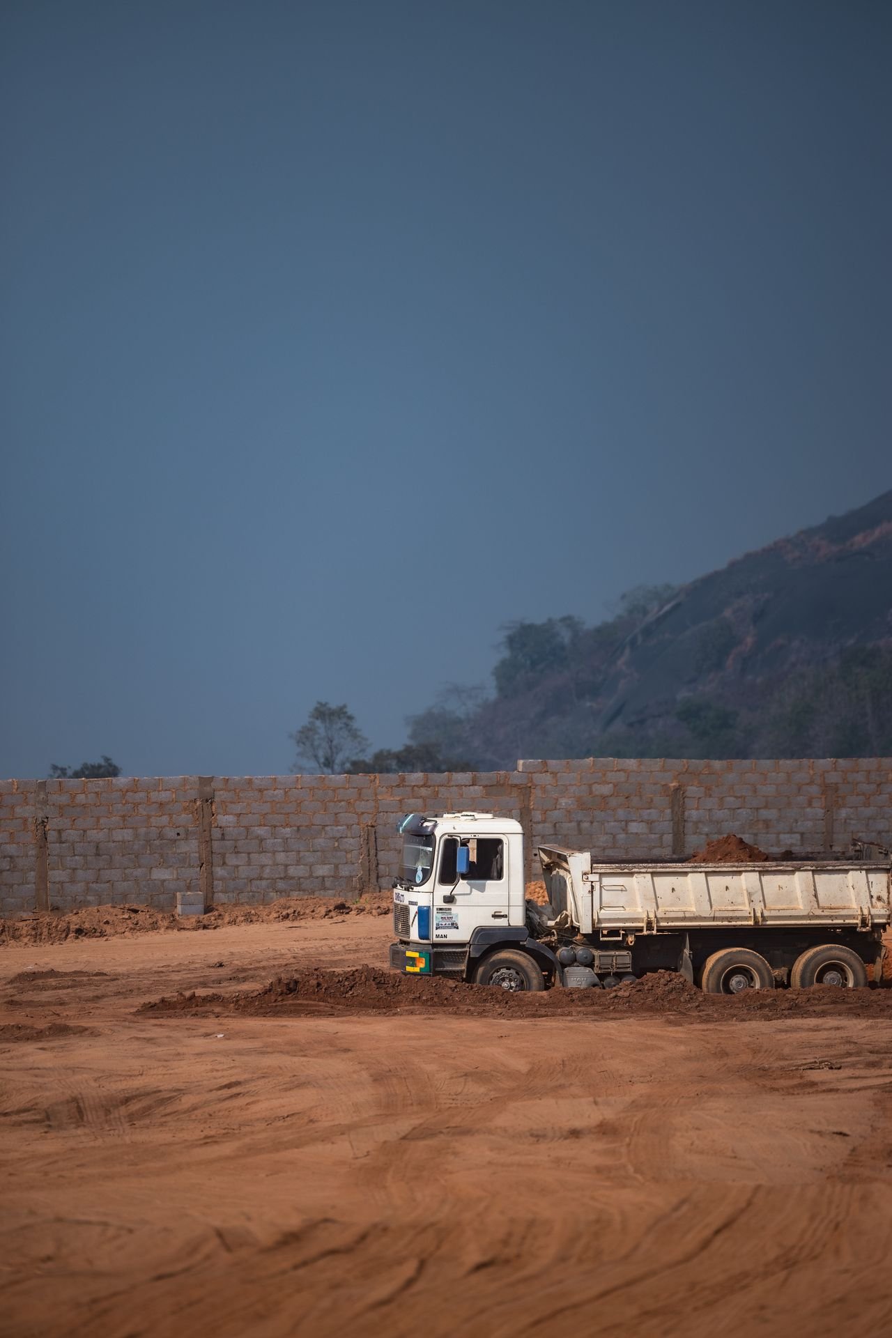 Dump truck operating on an active earthworks site